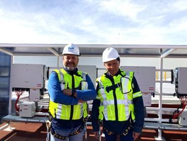 Raul Faudoa and Octavio Bocanegra pose at Toluca, Mexico solar installation site. 