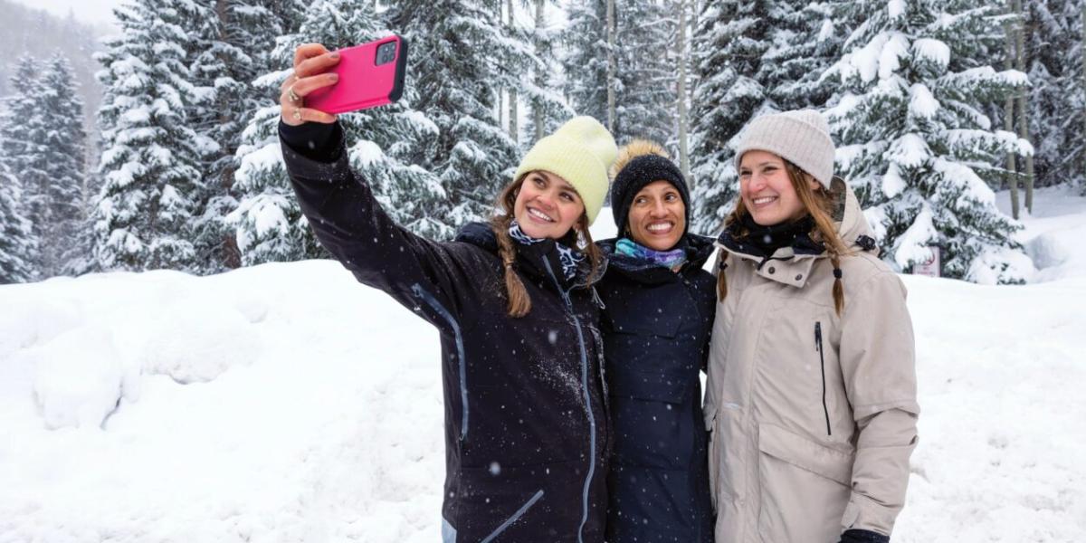 3 women taking a selfie in the snow