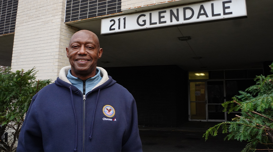 Freddie Tucker shown in front of 211 Glendale.