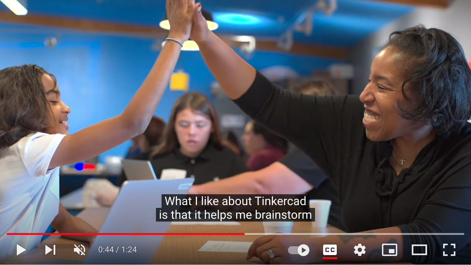 Student Jazmyn Singleton and parent Tiffany Rosenburg celebrate after finishing a 3D-design lesson.