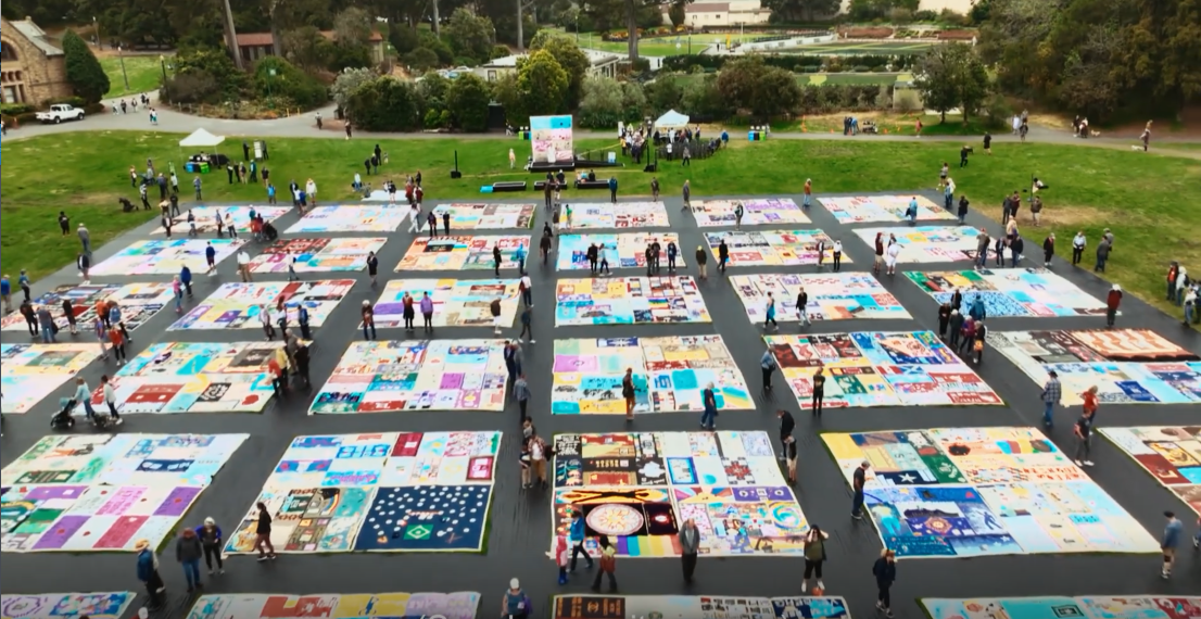 Quilts laid out on the ground