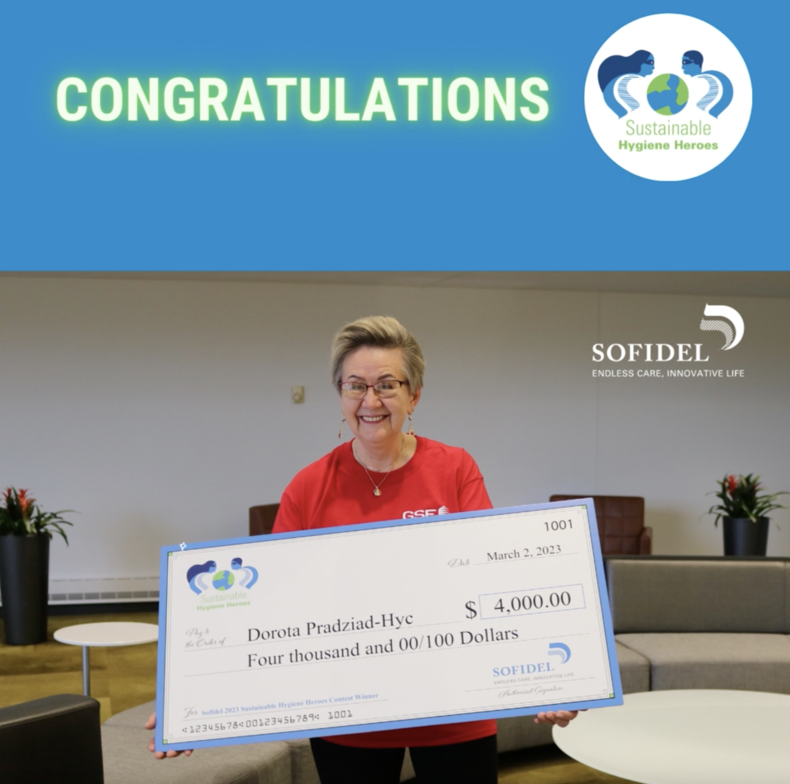 Dorota Pradziad-Hyc holding check from Sofidel