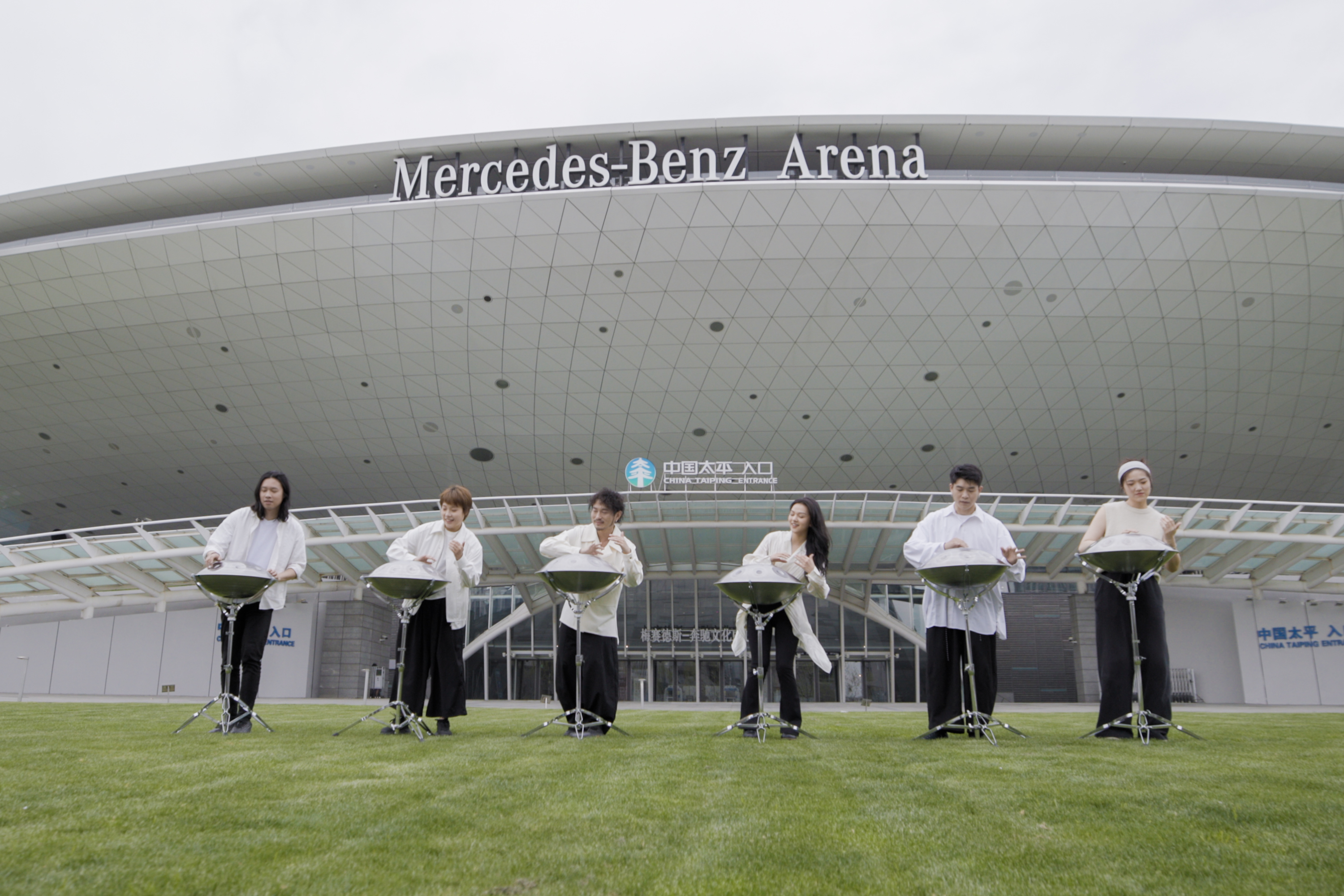 AETHER performing in front of Mercedes-Benz Arena Shanghai.
