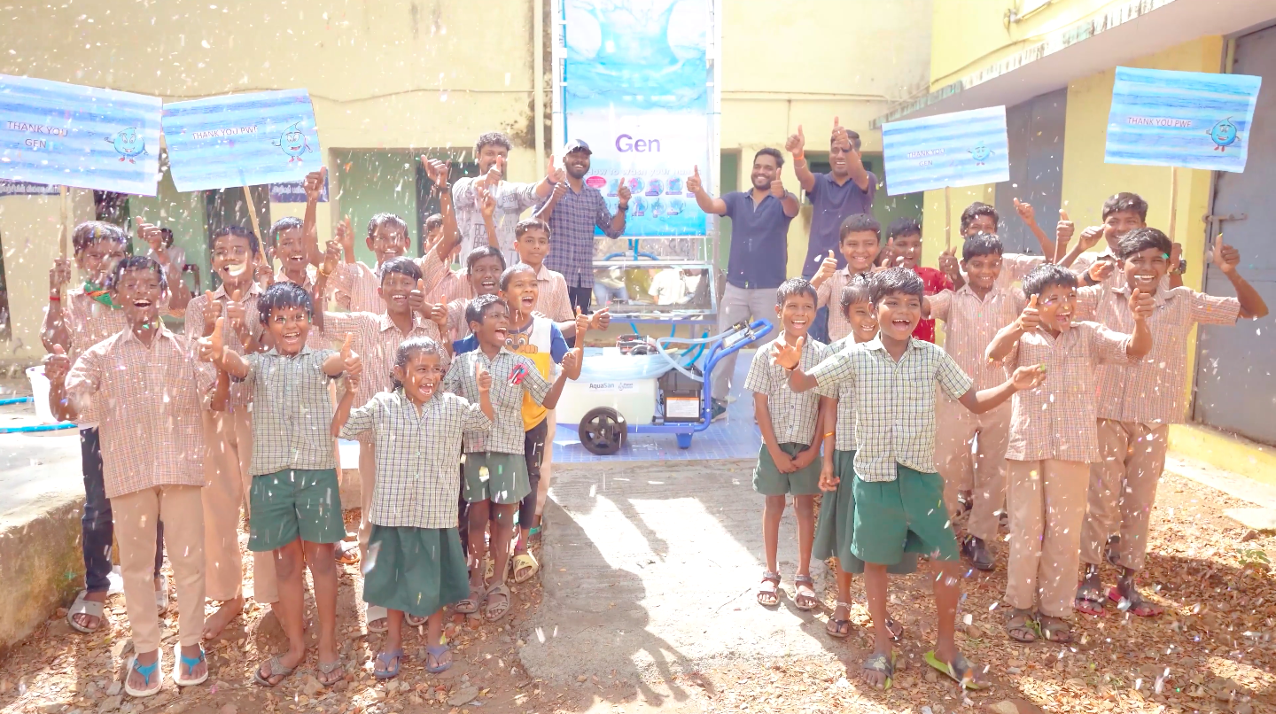 Kids celebrating in front of an AquaTower
