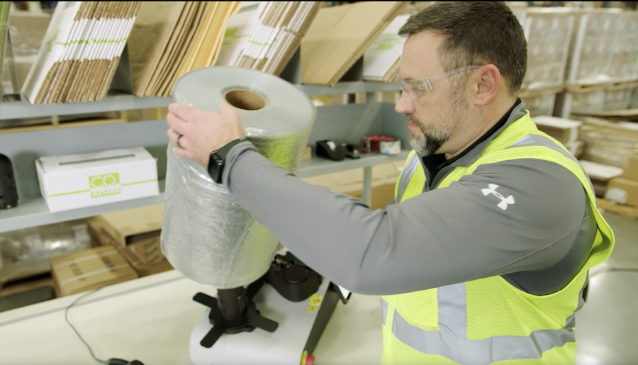 Man with roll of tape. 