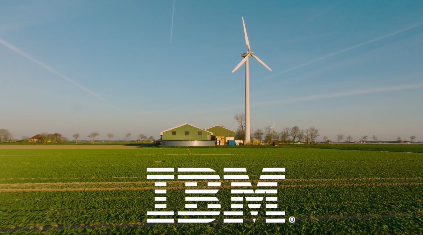 Farm and wind turbine with IBM logo overlaid