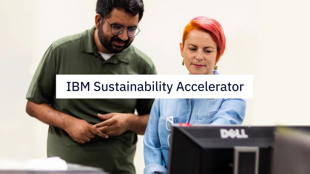 Man and woman looking at computer monitor