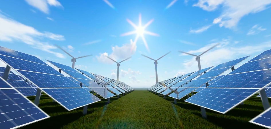 field with solar panels and windmills 