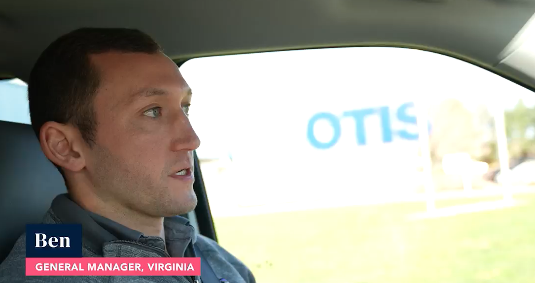 Otis employee driving EV