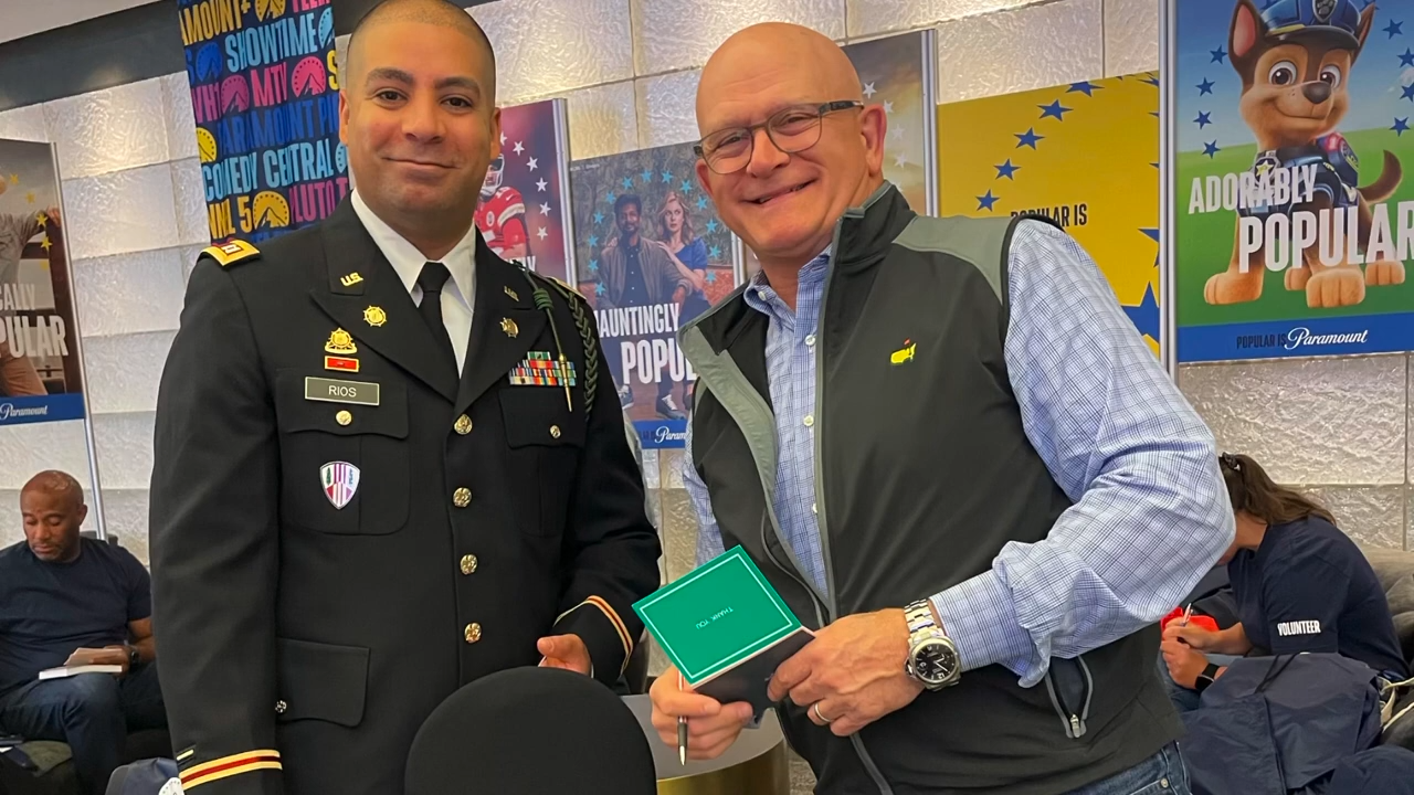 Active duty soldier with a Paramount employee