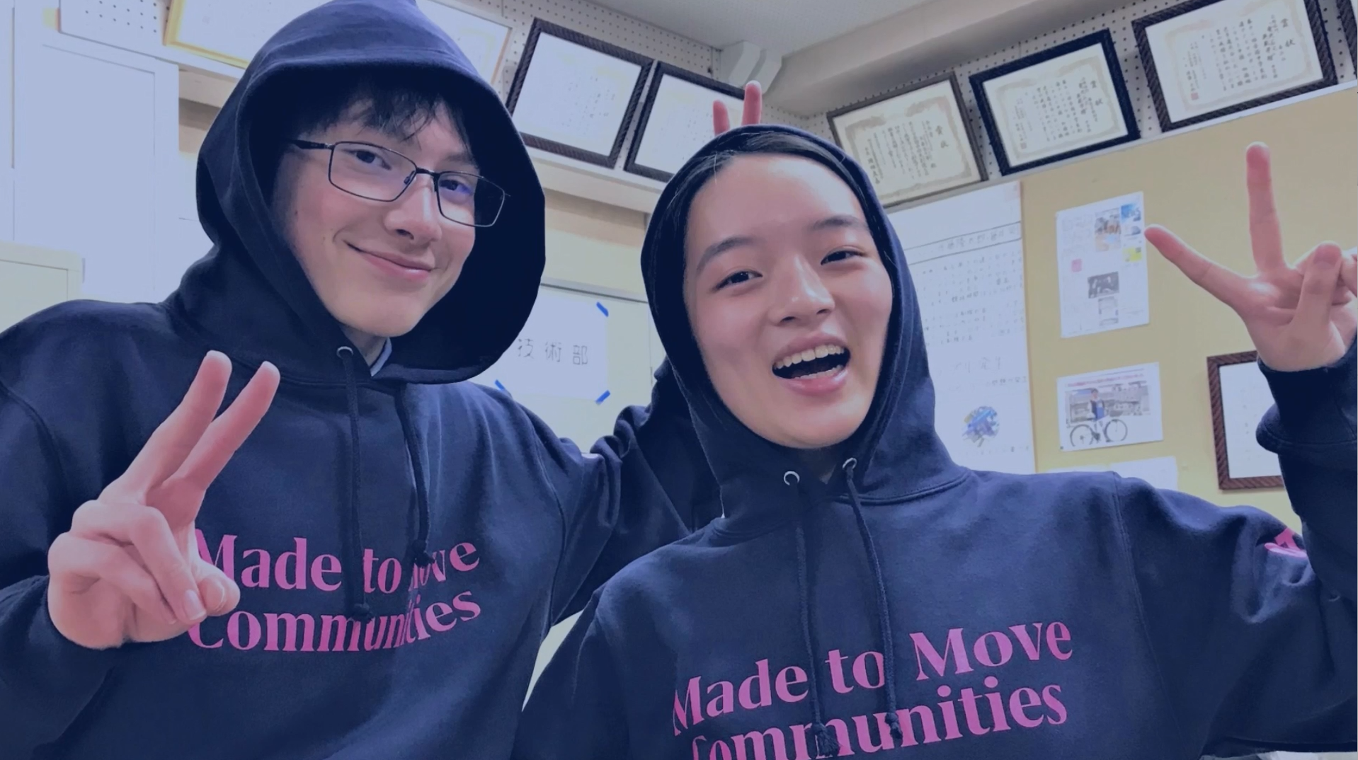 Otis STEM students smiling and waving