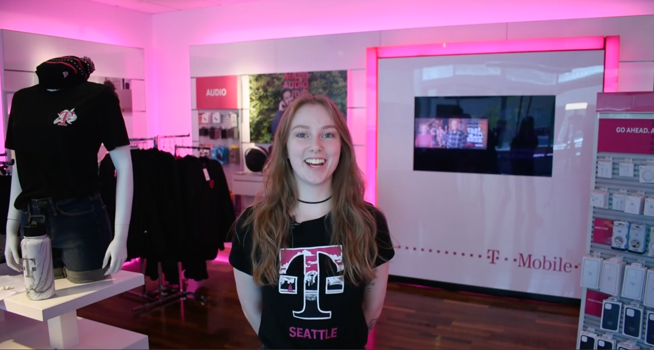 T-Mobile employee in a T-Mobile Seattle T-shirt