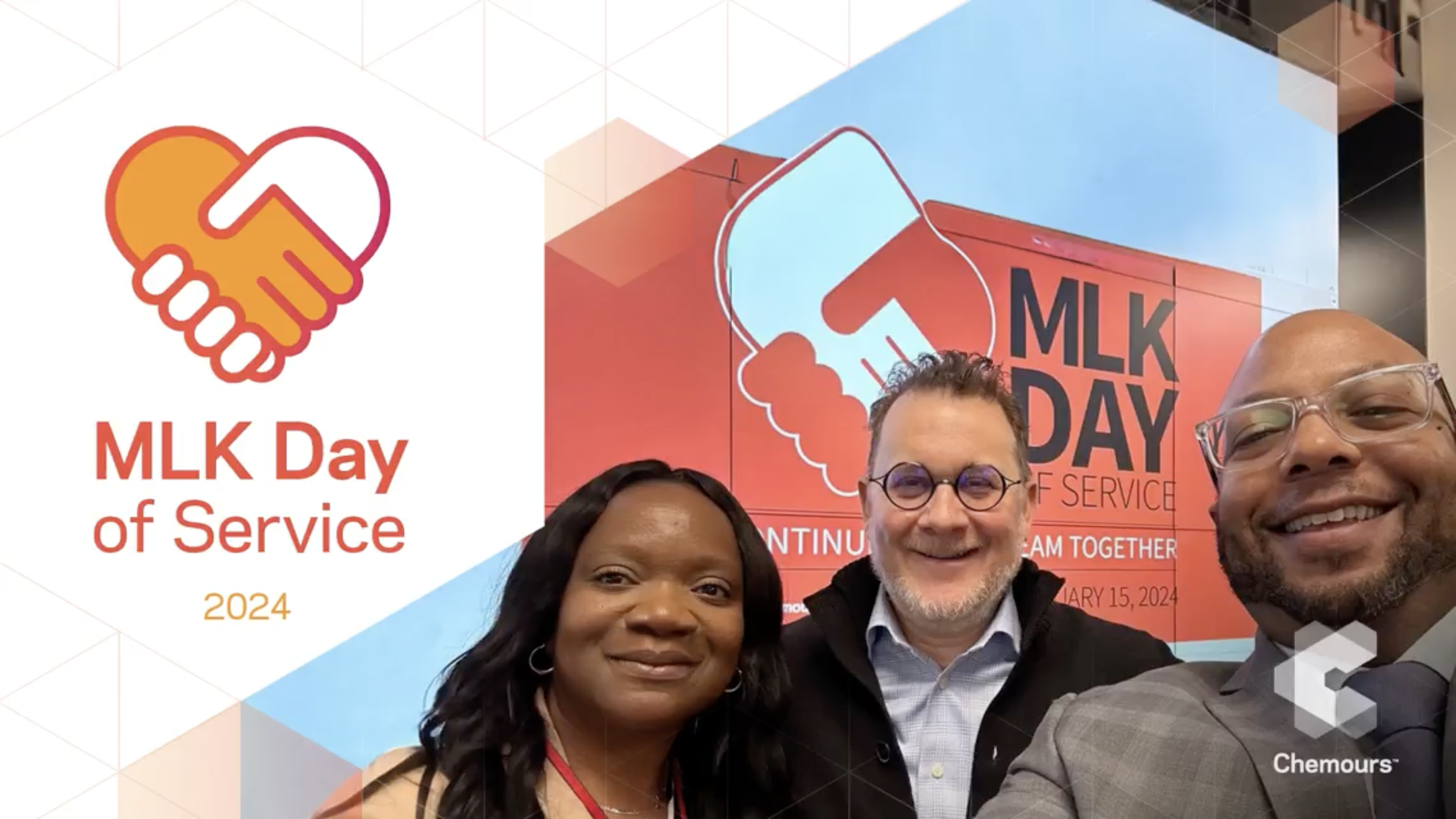 3 people stood together taking a photo