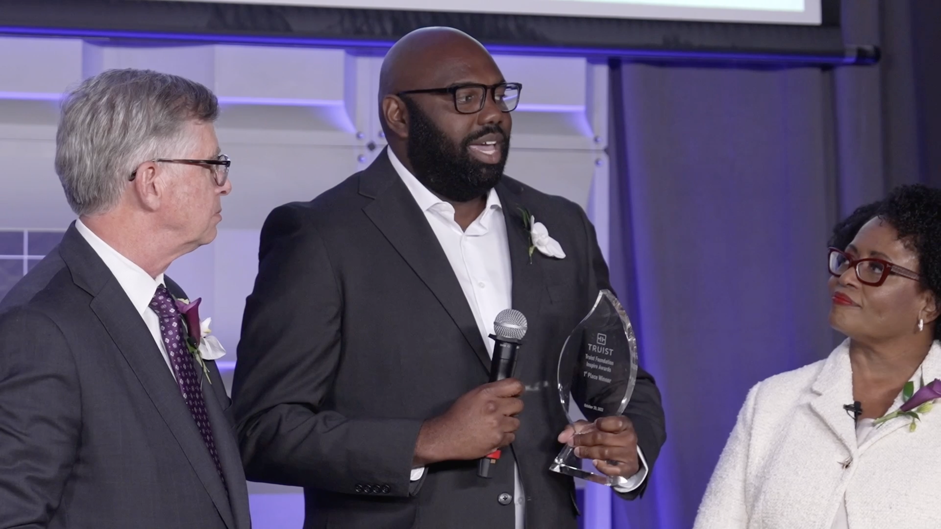 A person receiving an award