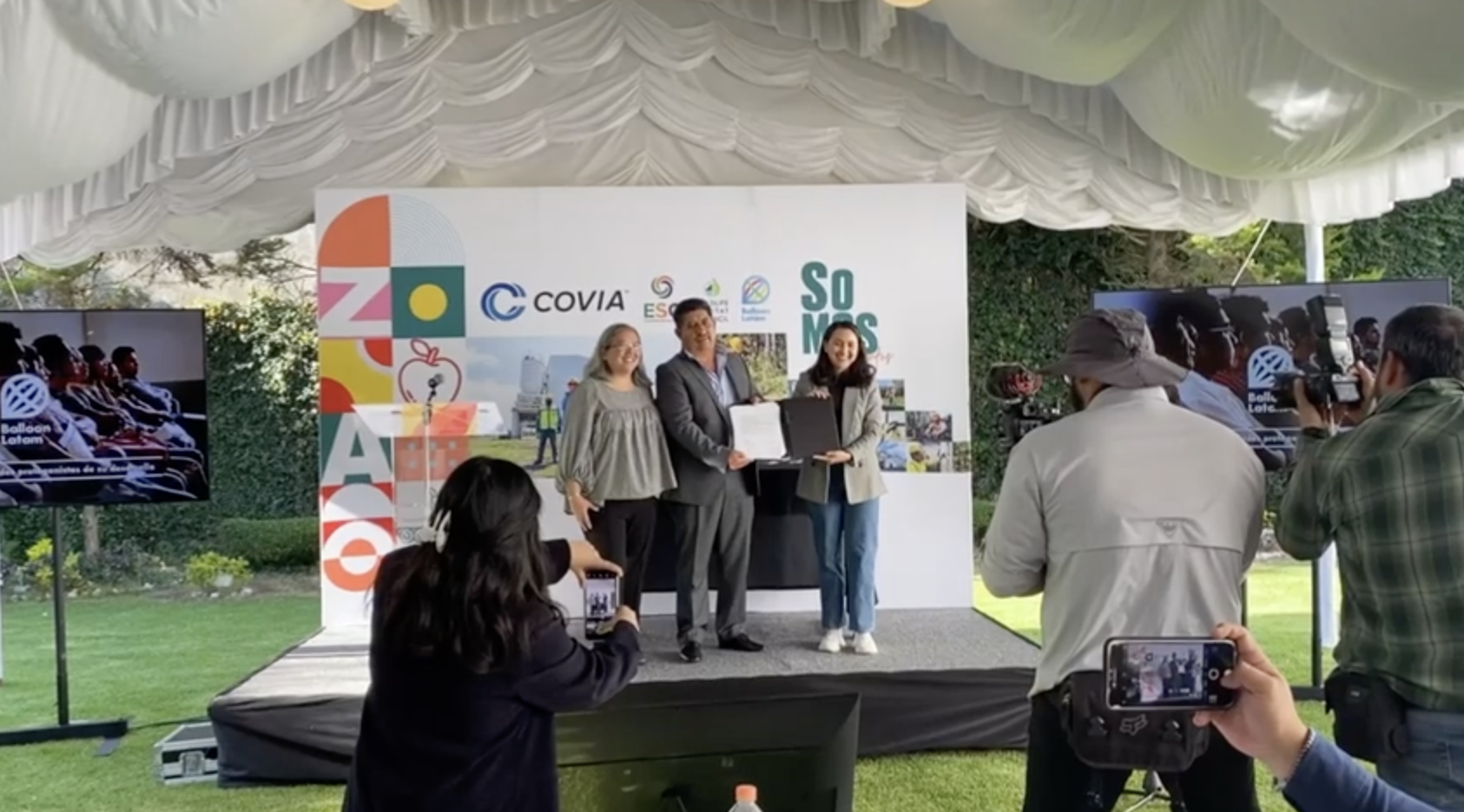 accepting an award on stage