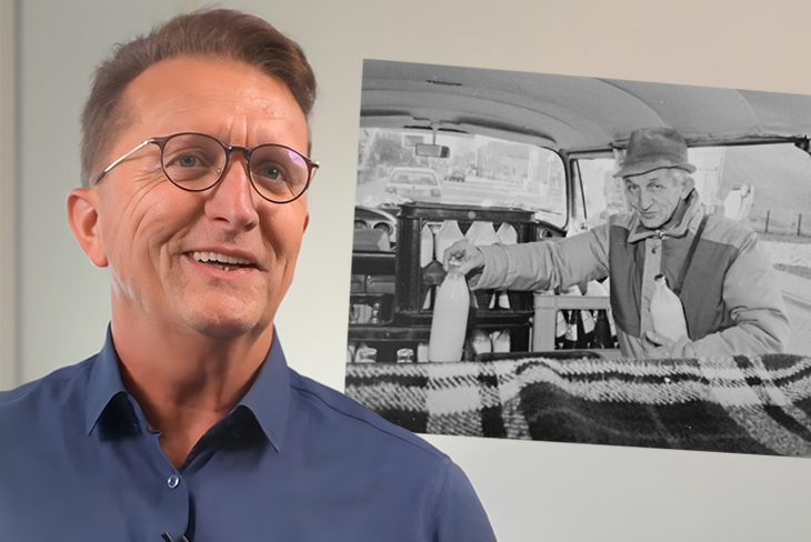 Leo with a black and white inset photo of his father placing milk bottles into a vehicle