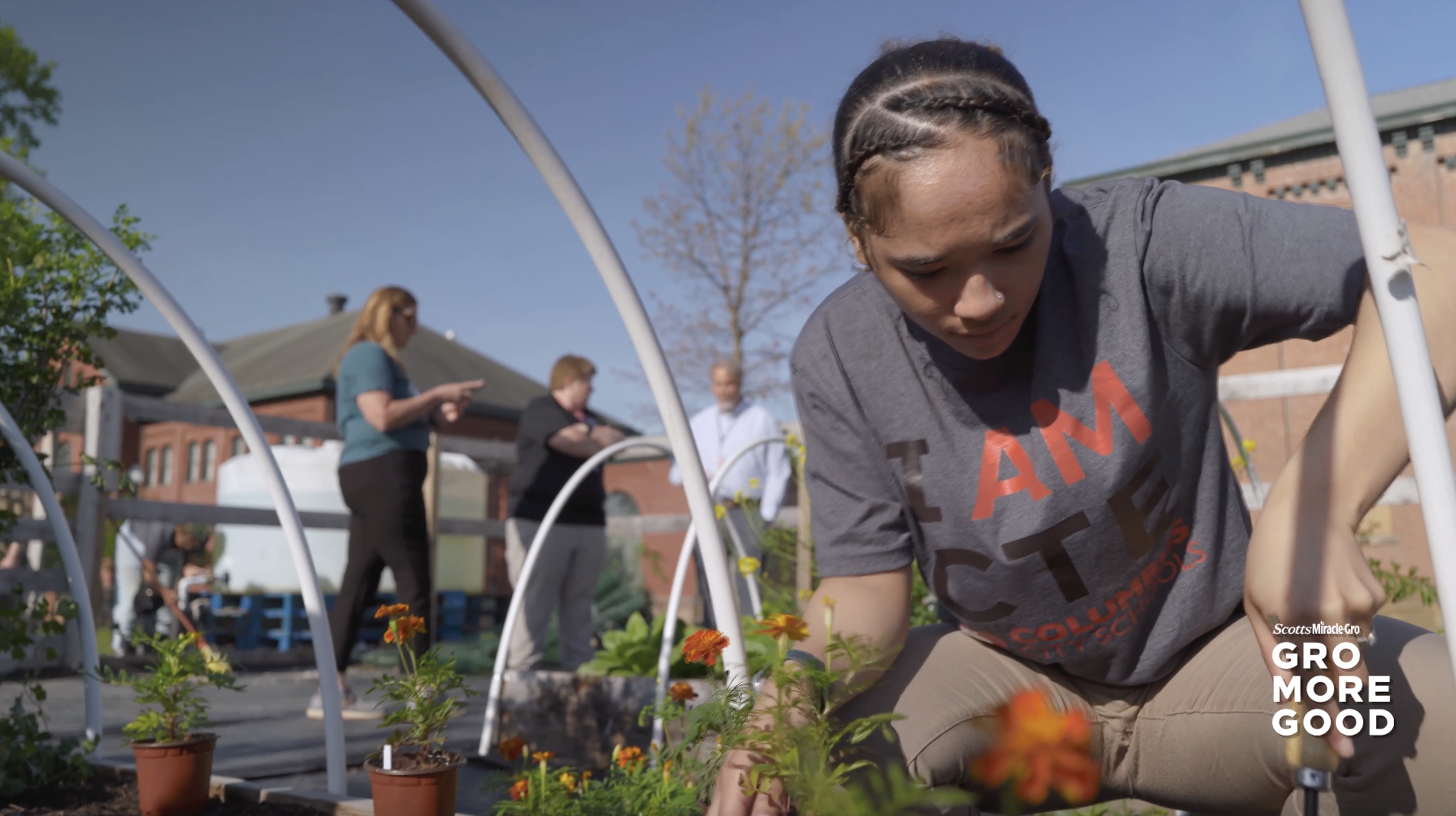 Students working in a garden