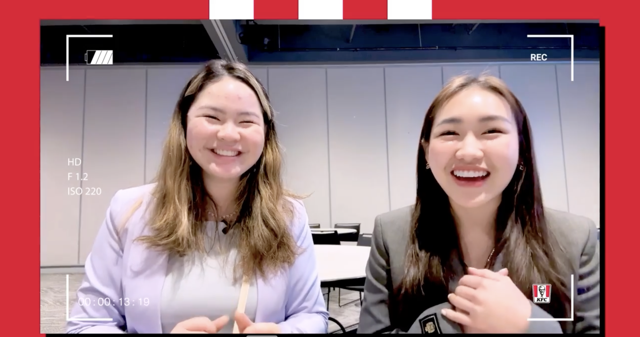 girls smiling into a screen