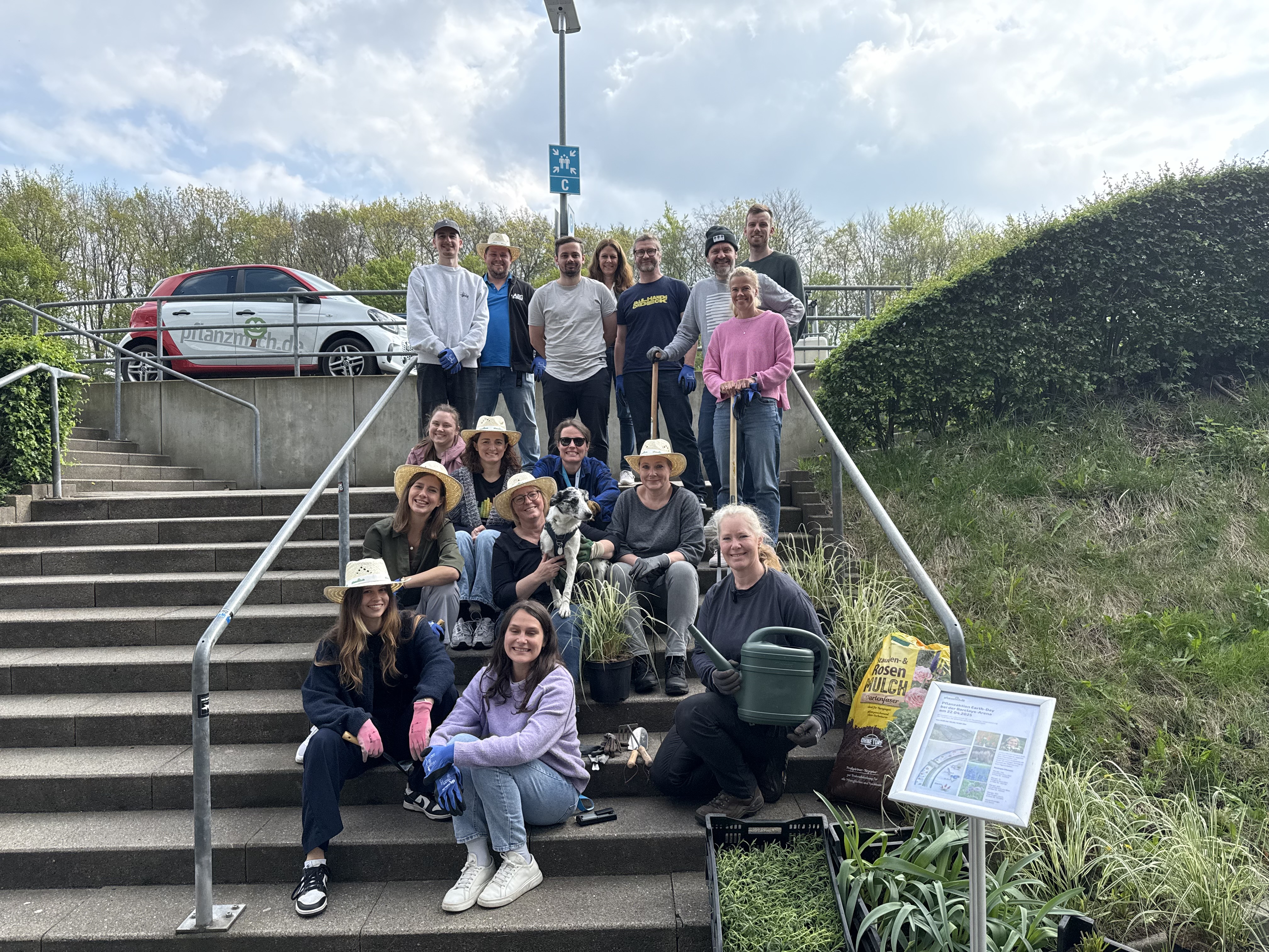 Equipped with shovels, gloves, and watering cans, the group spent the day planting a total of 412 new plants and sowing flower seeds.