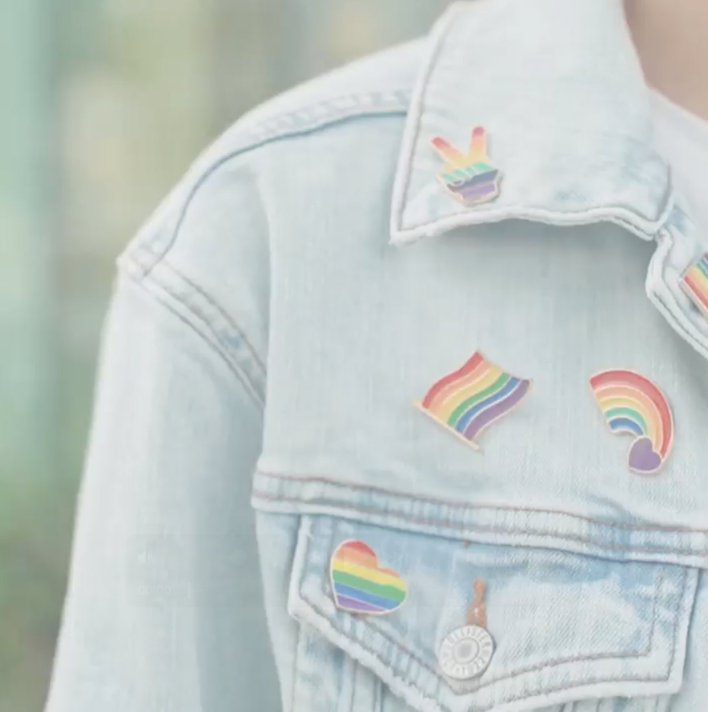 Jacket with Pride pins