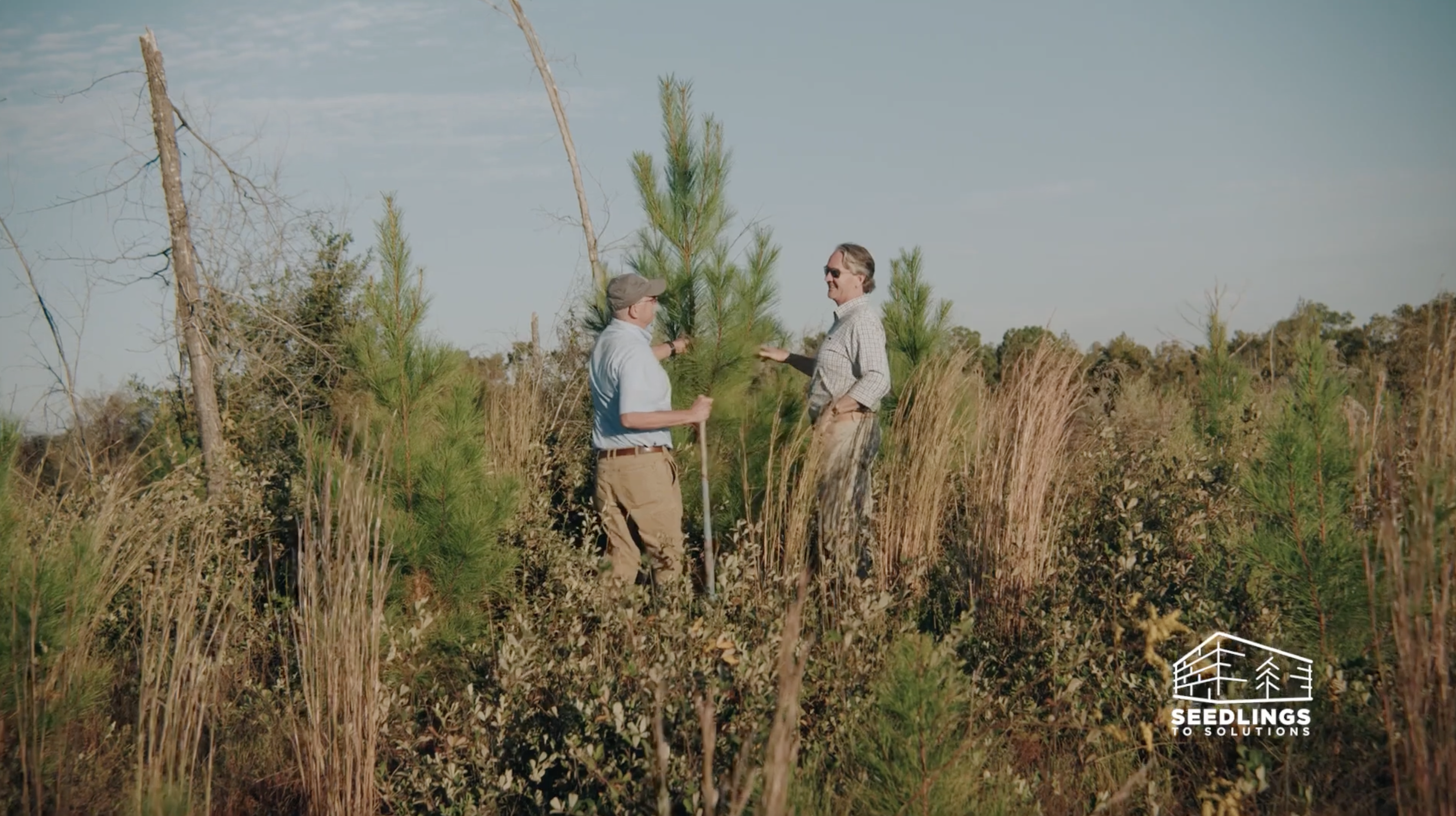image of two men in a field