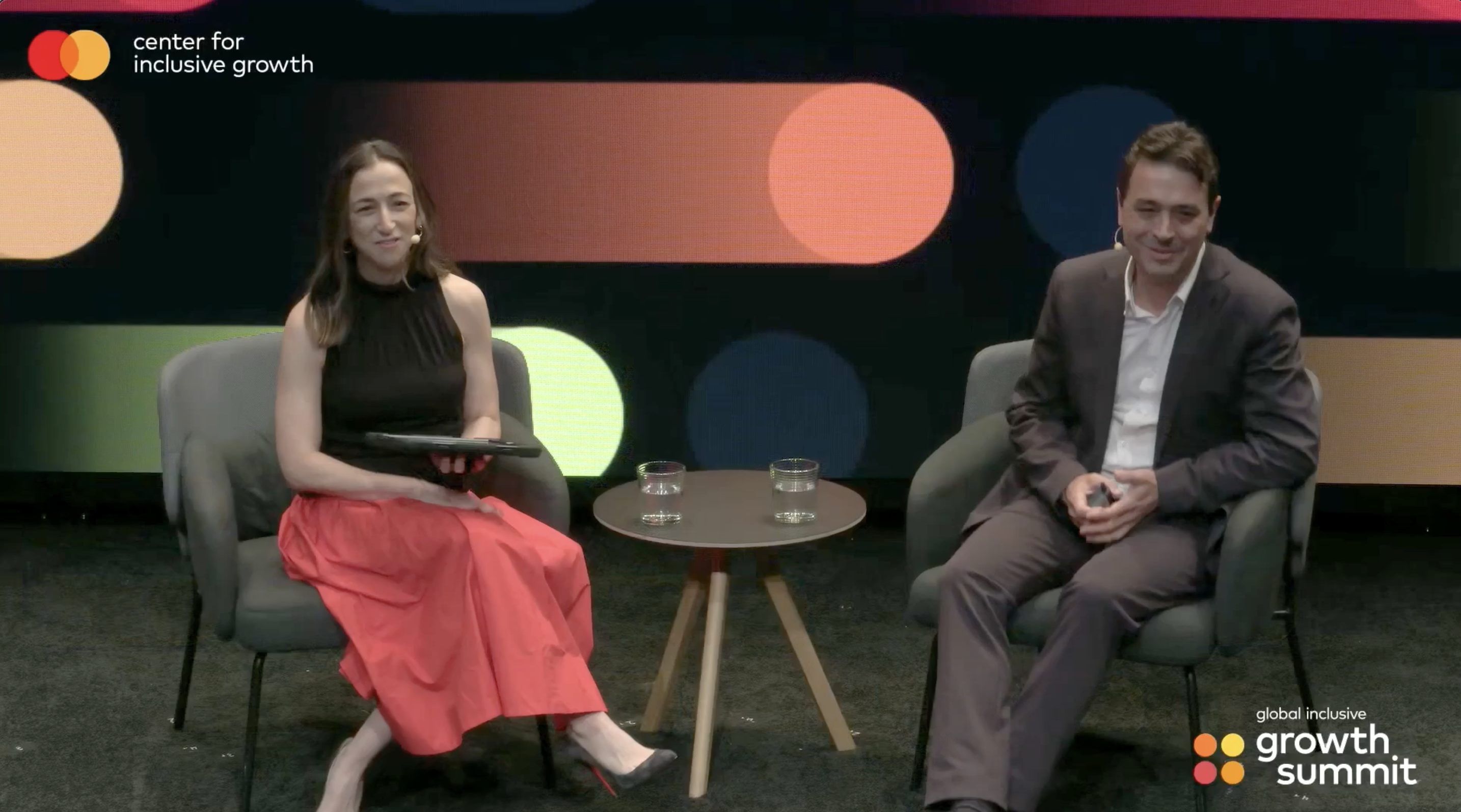 two speakers at the Global Inclusive Growth Summit