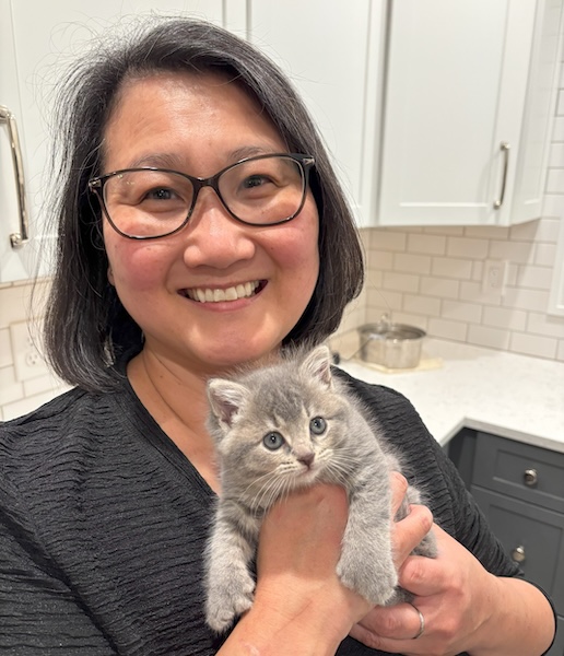 Holly holding a kitten.