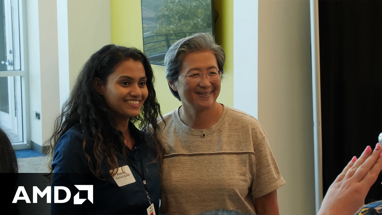 two people smiling together