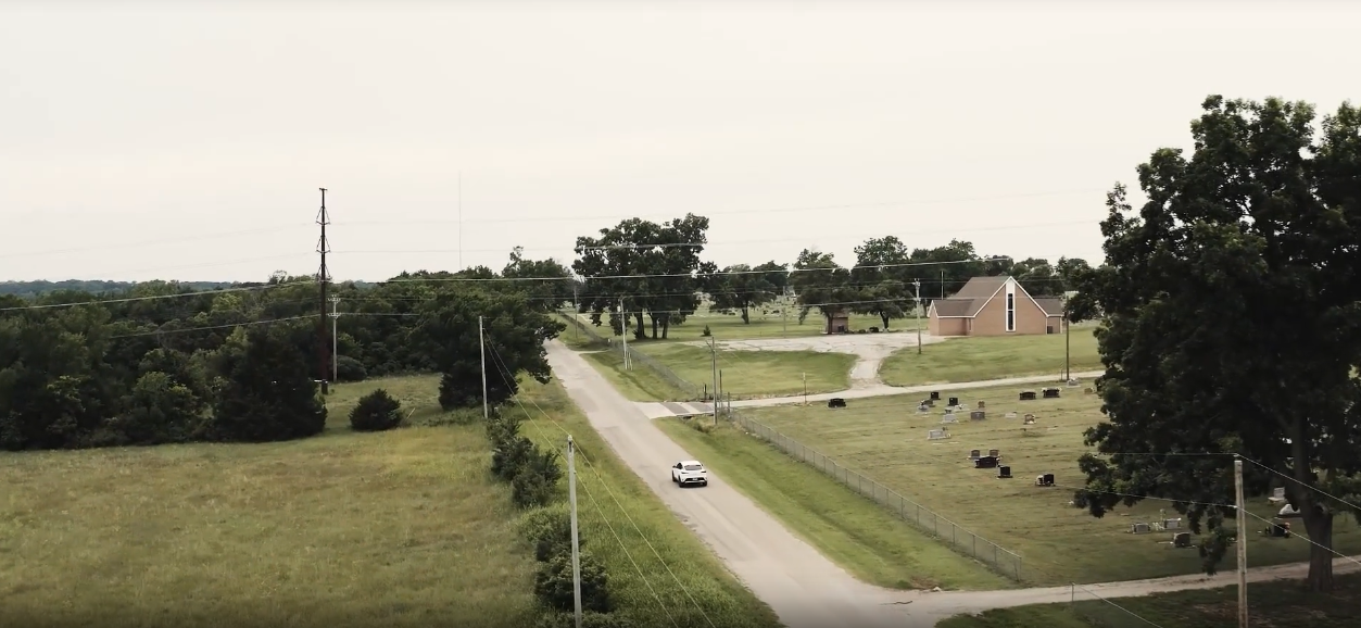 Car driving down a road