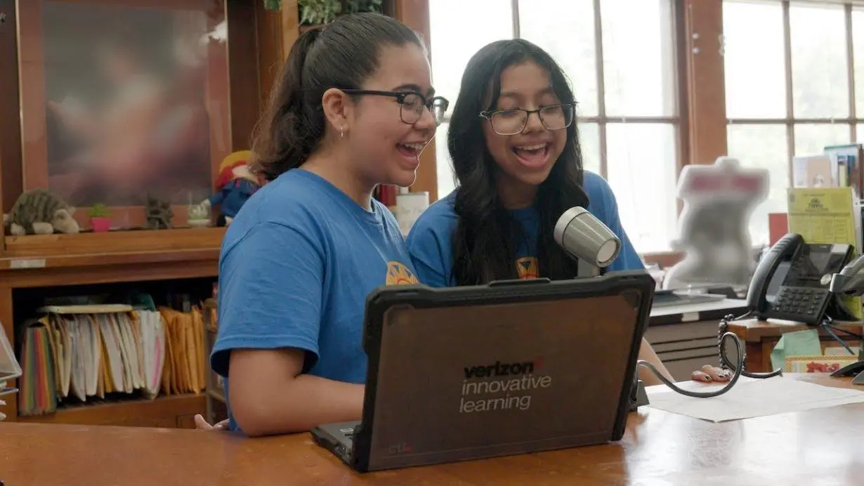 Abril Contreras-Reyes and Paulina Martinez-Garcia deliver the morning announcements at Academia de Lenguaje y Bellas Artes (ALBA).