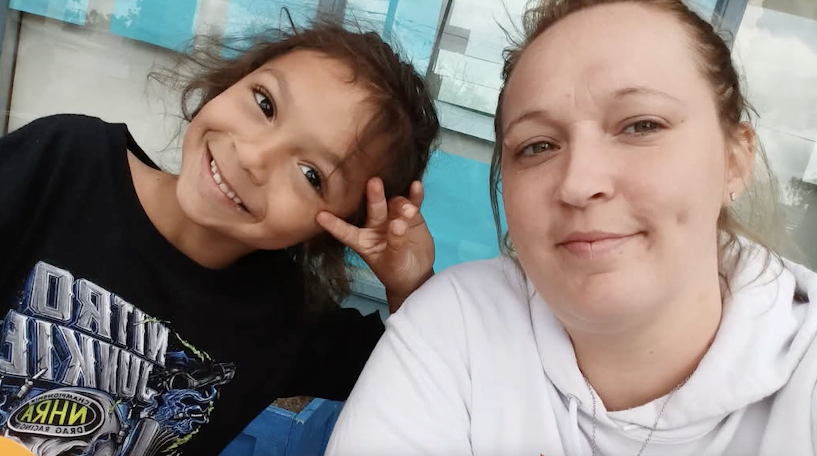 Smiling caregiver and child