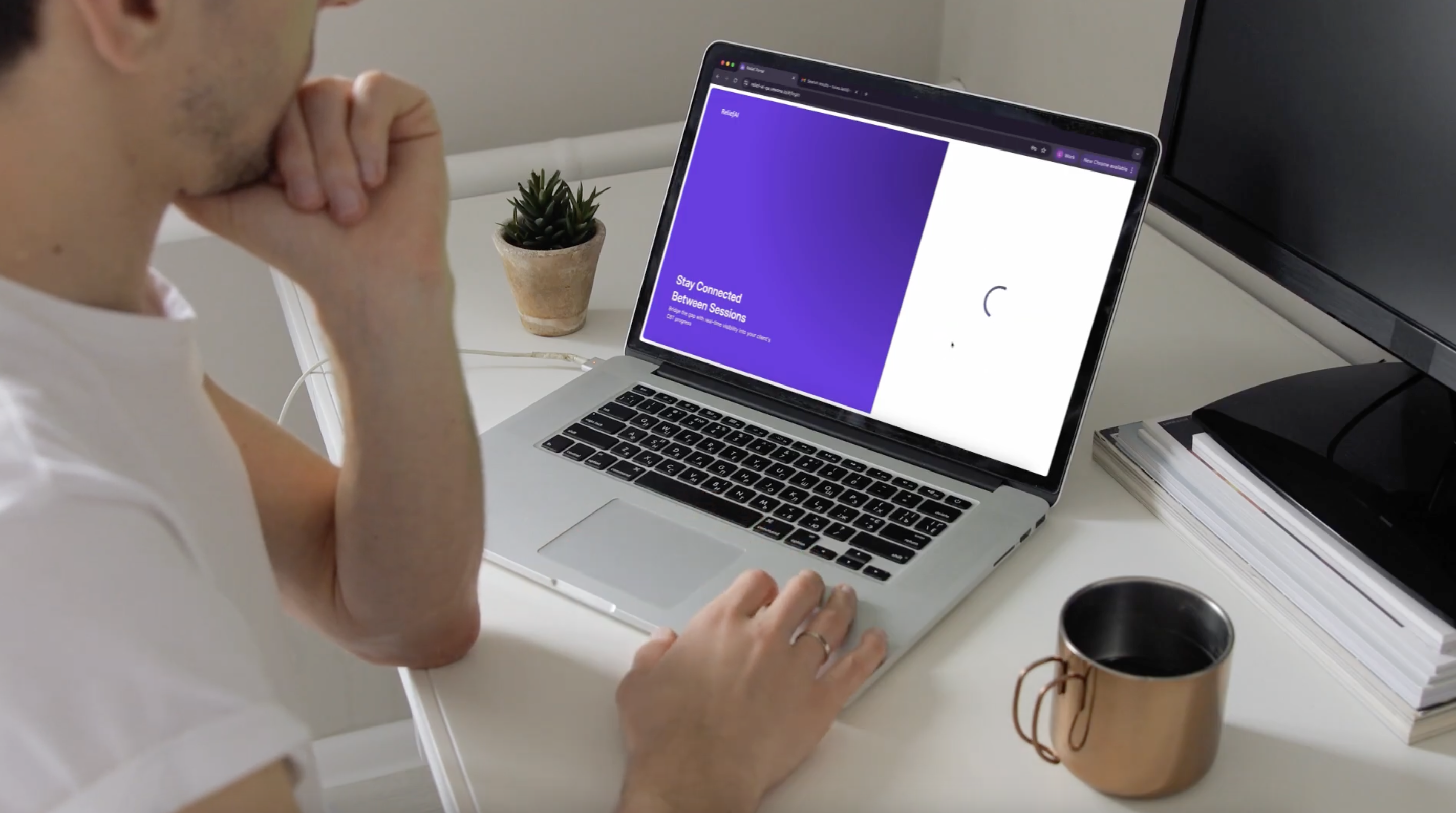 Person looking at open laptop