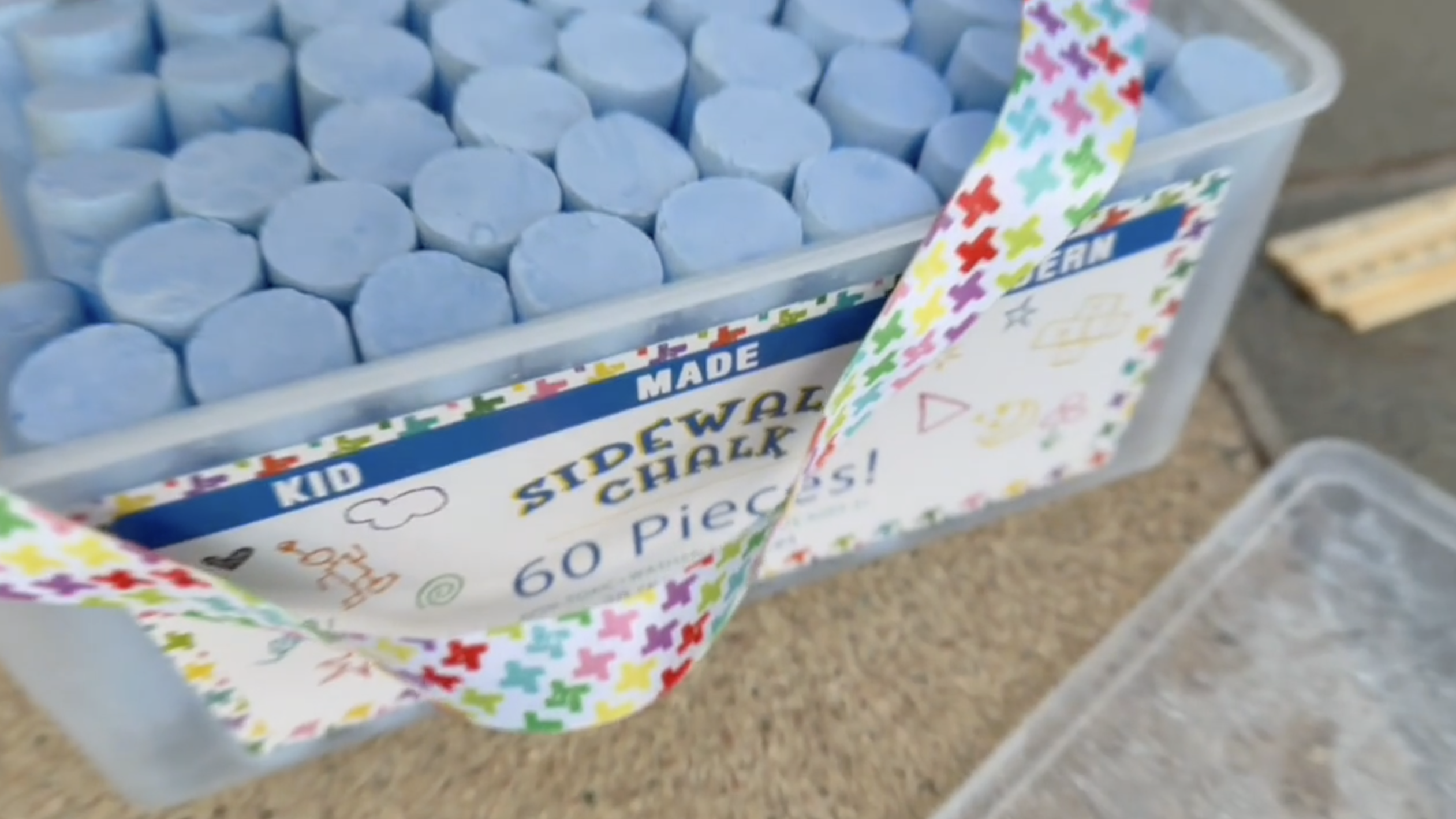 Box of sidewalk chalk.