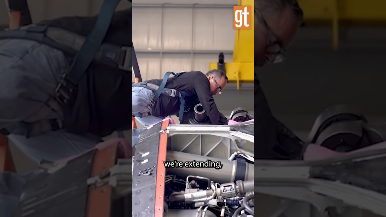 Someone working on machinery