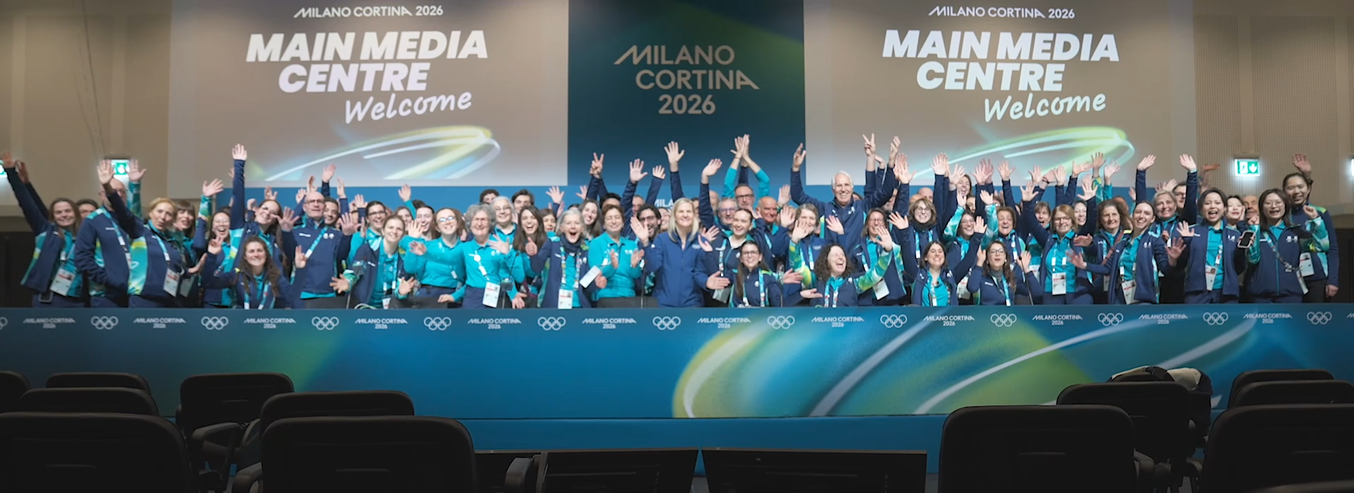 Olympic volunteers cheering