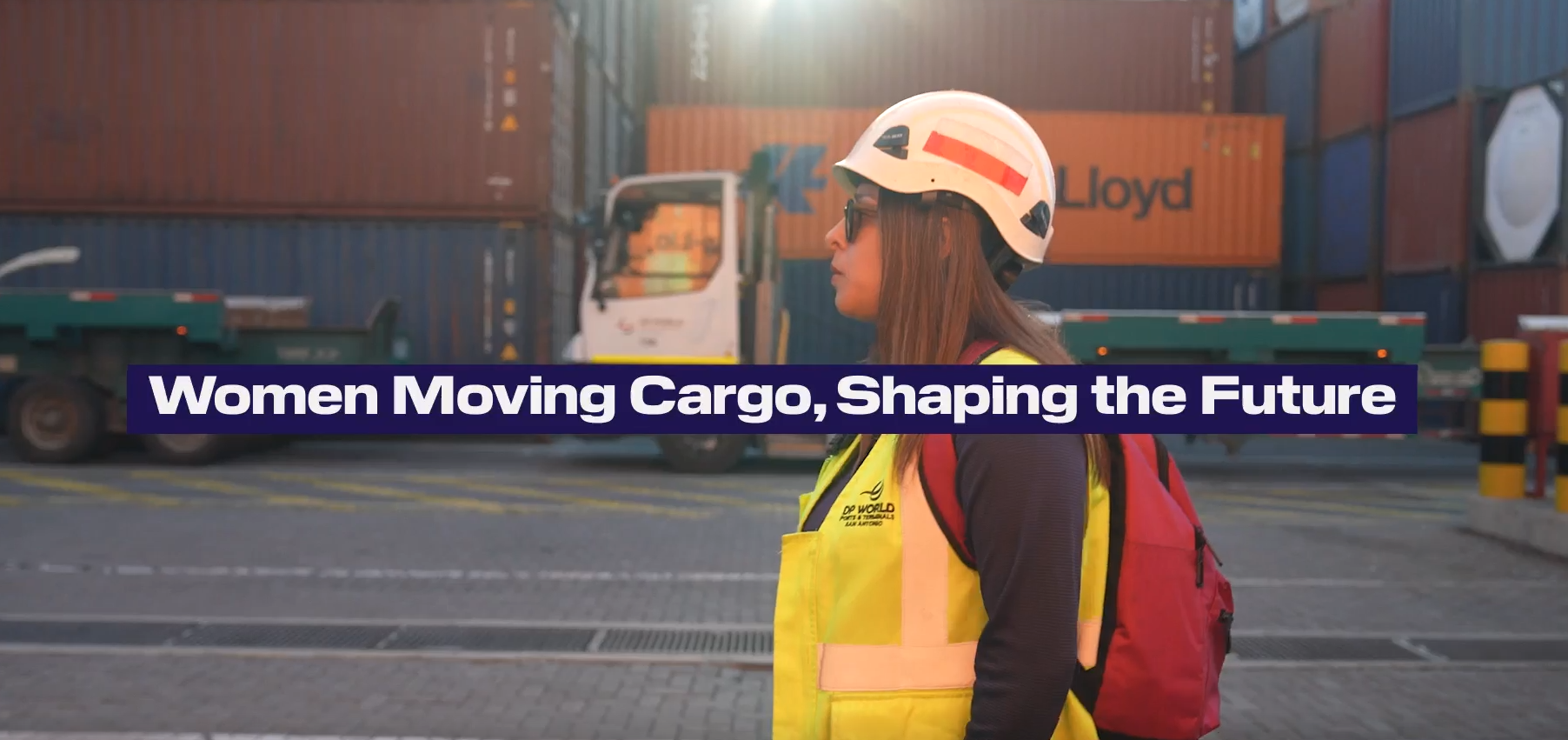 Carolina walking through the container yard at San Antonio to start her day's work as an RTG operator.