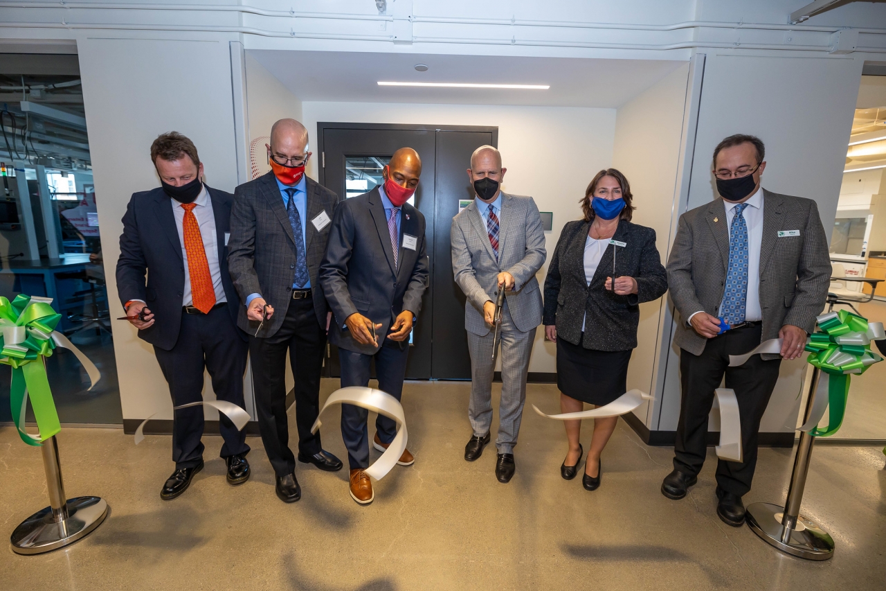 (From L to R) Rockwell’s Michael Cook, Jeff Petro, and Marzell Brown; CSU President Harlan Sands, Interim Washkewicz College of Engineering Dean Joanne Belovich, and Engineering Technology Department Chair and Professor Michael Adams celebrate the grand opening of the Rockwell Automation Connected Enterprise Laboratory.