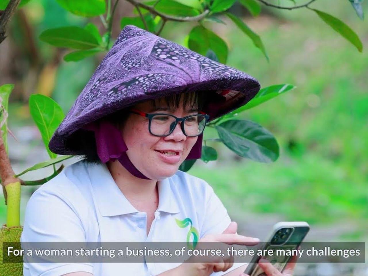 Woman typing on smart phone