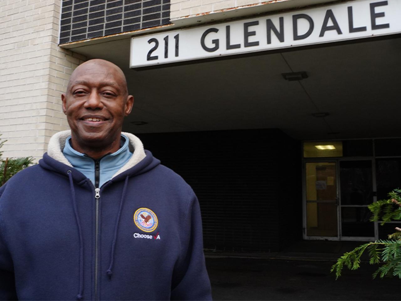 Freddie Tucker shown in front of 211 Glendale.