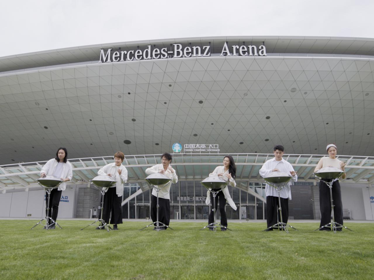 AETHER performing in front of Mercedes-Benz Arena Shanghai.