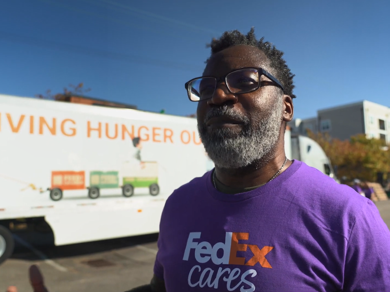 A volunteer at a food drive.