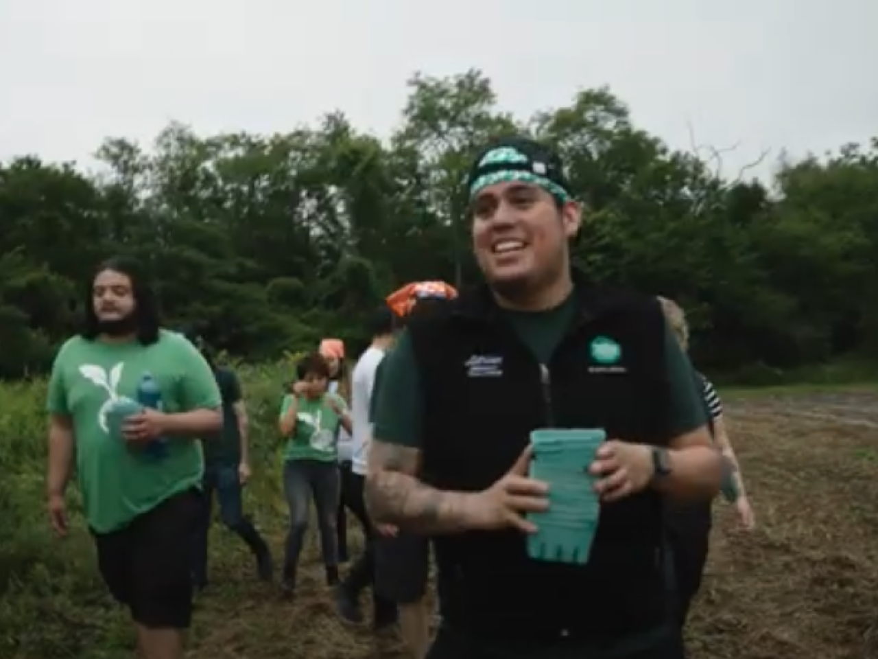People walking in a field together