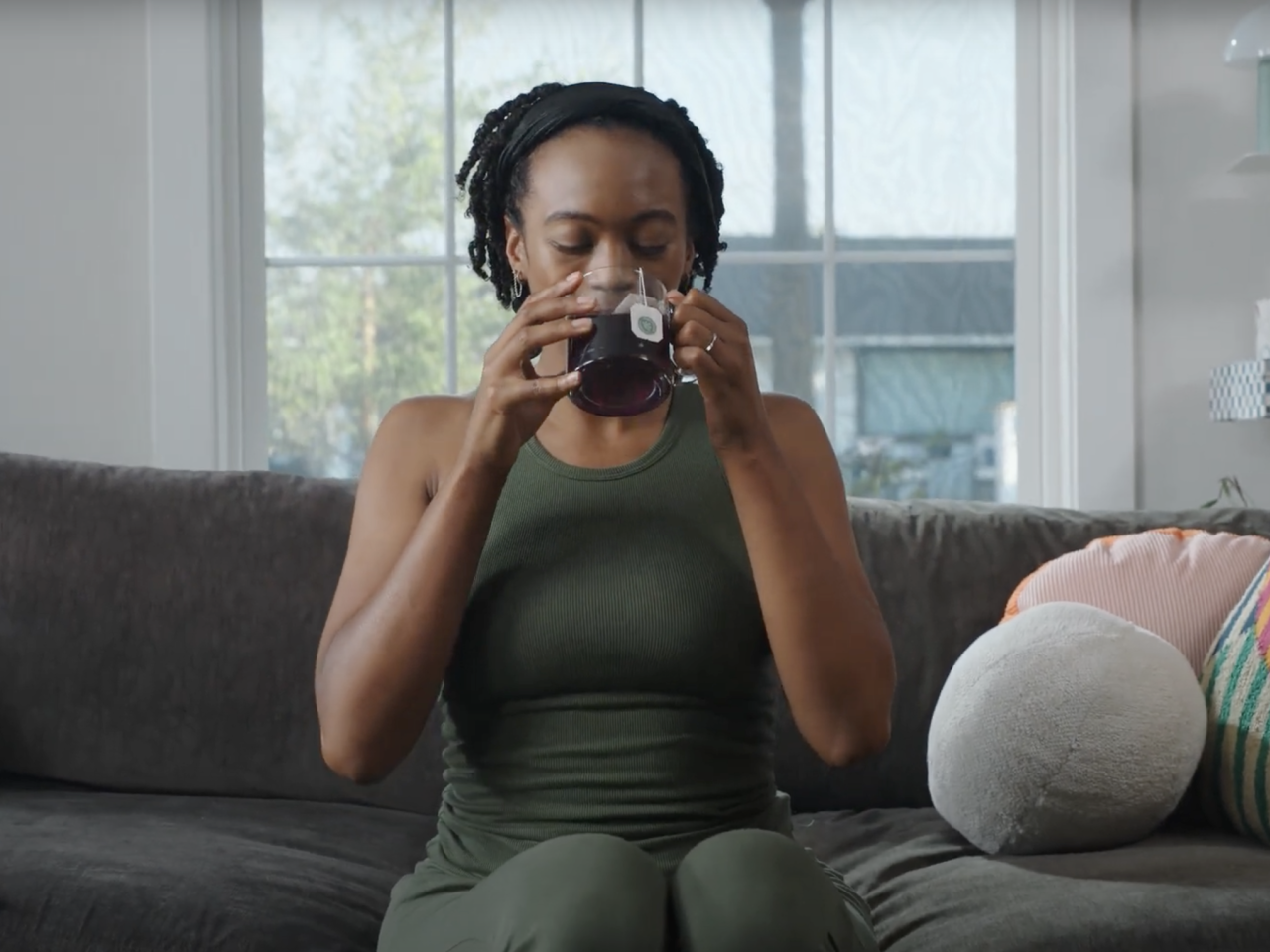 person drinking tea