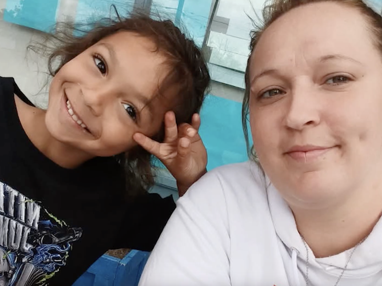 Smiling caregiver and child