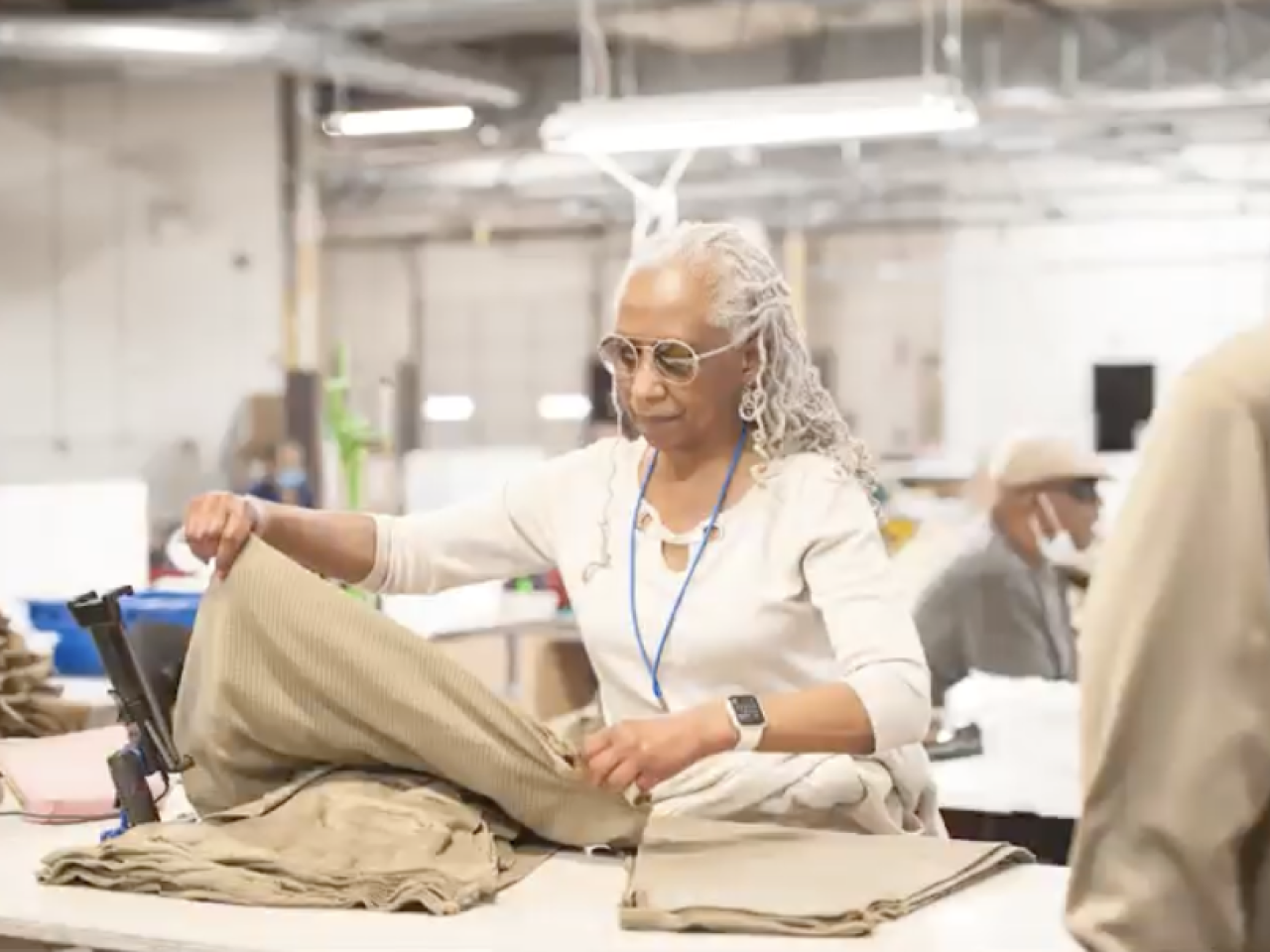 person working to make clothing