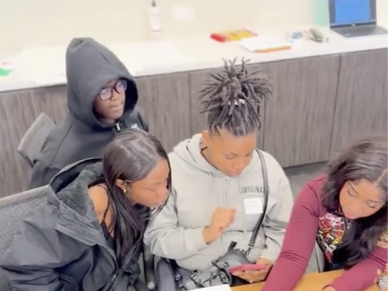 Four students working together