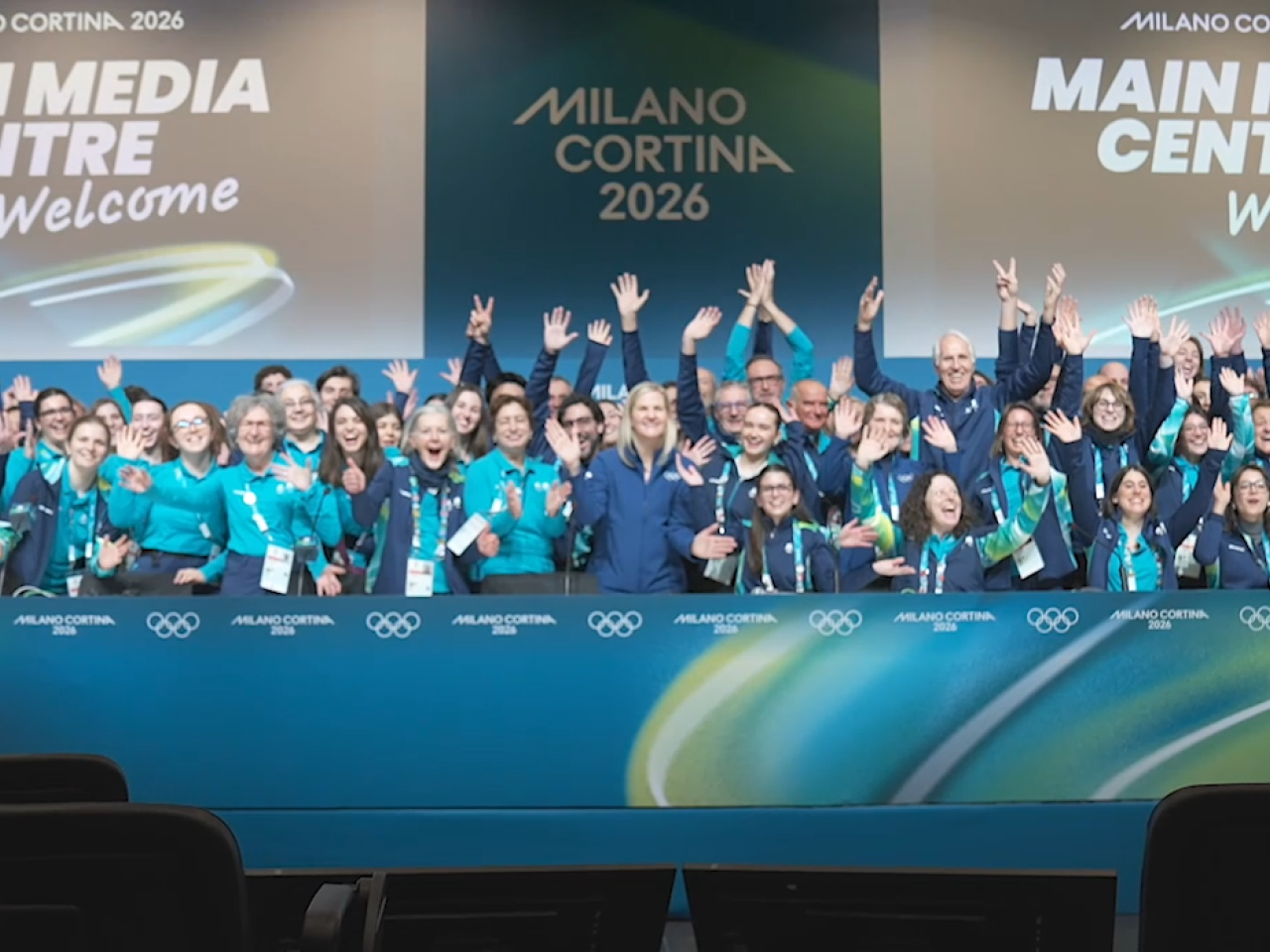 Olympic volunteers cheering