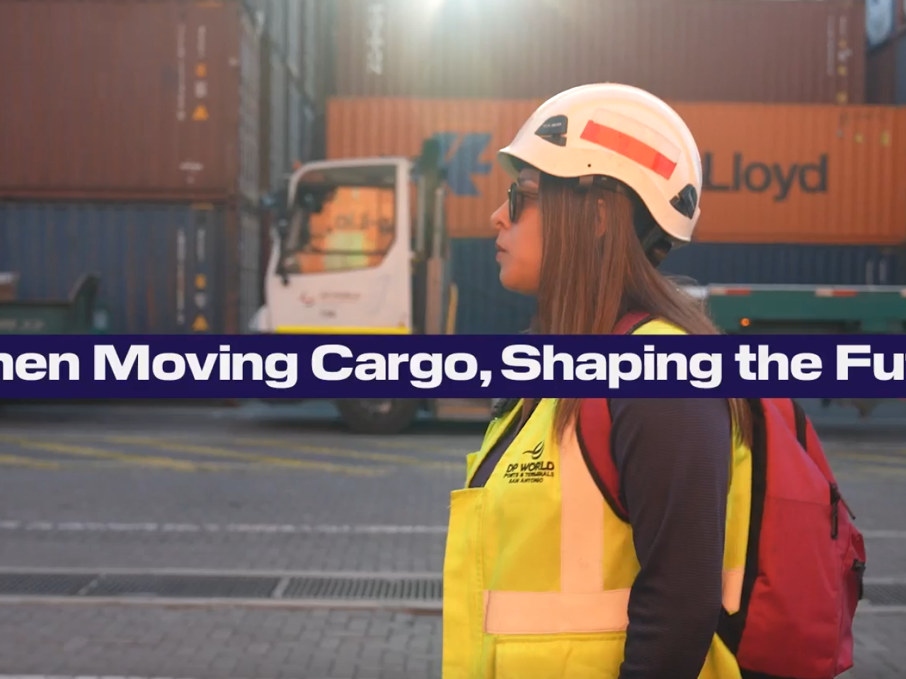 Carolina walking through the container yard at San Antonio to start her day's work as an RTG operator.