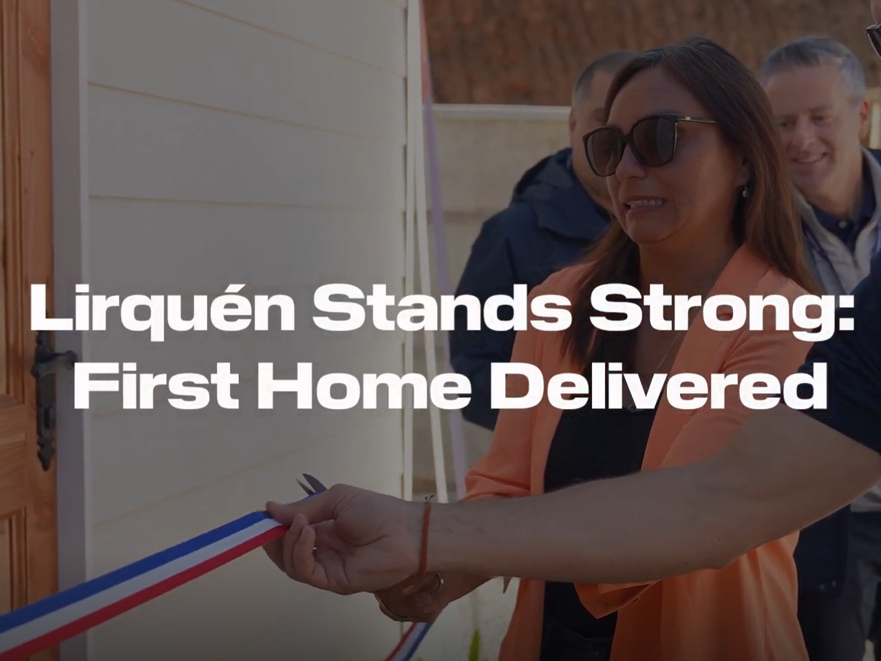 Image of ribbon cutting at event marking DP World's first home rebuild in Lirquen.