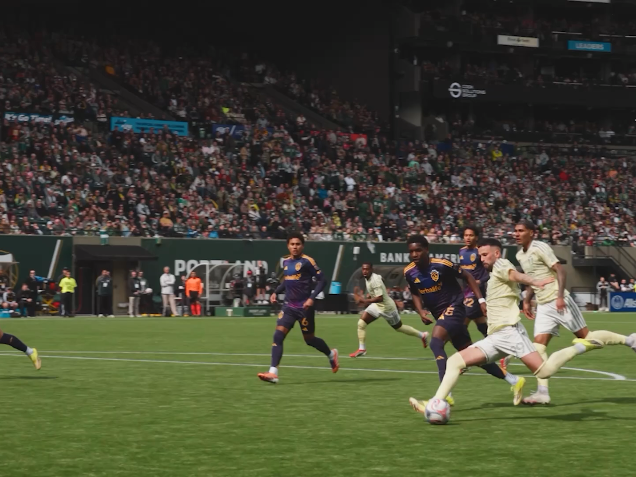 Soccer players playing on the field